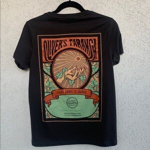 Oliver’s Taranga Vineyards.  Dark grey tee shirt w/ graphic print